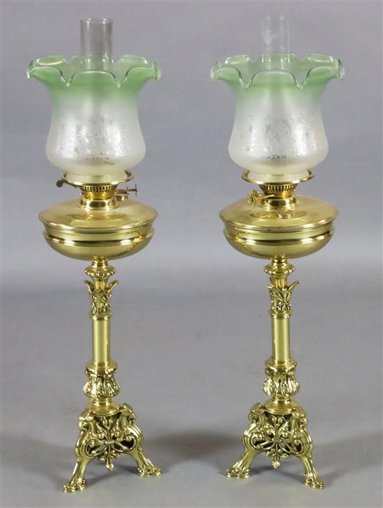 A pair of Victorian brass oil lamps, height without glass 21in.